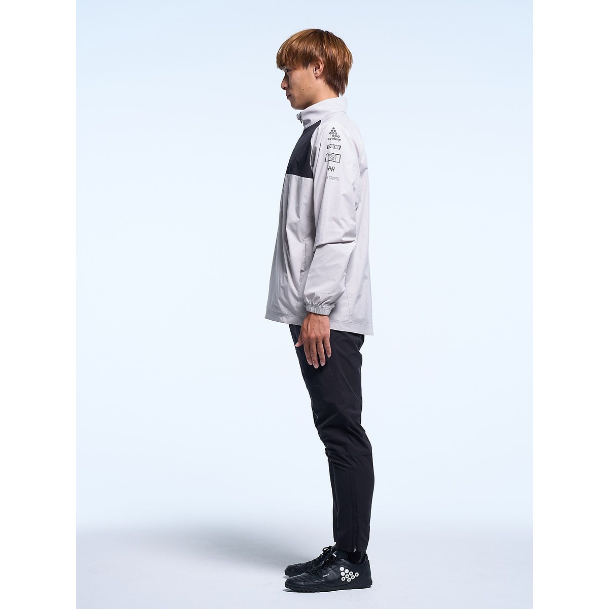 ハーフジップピステトップ