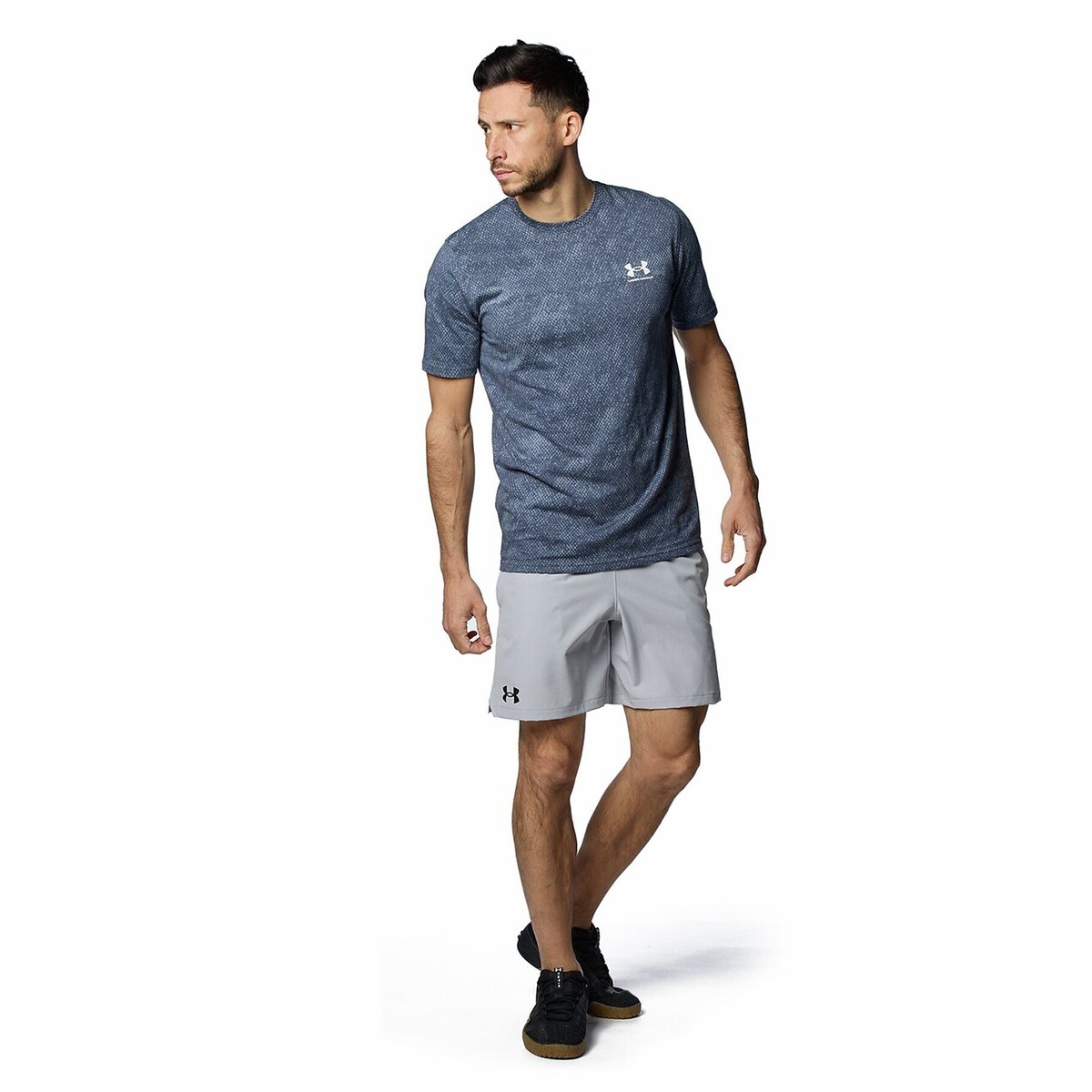 UA WOVEN 7 INCH SHORTS