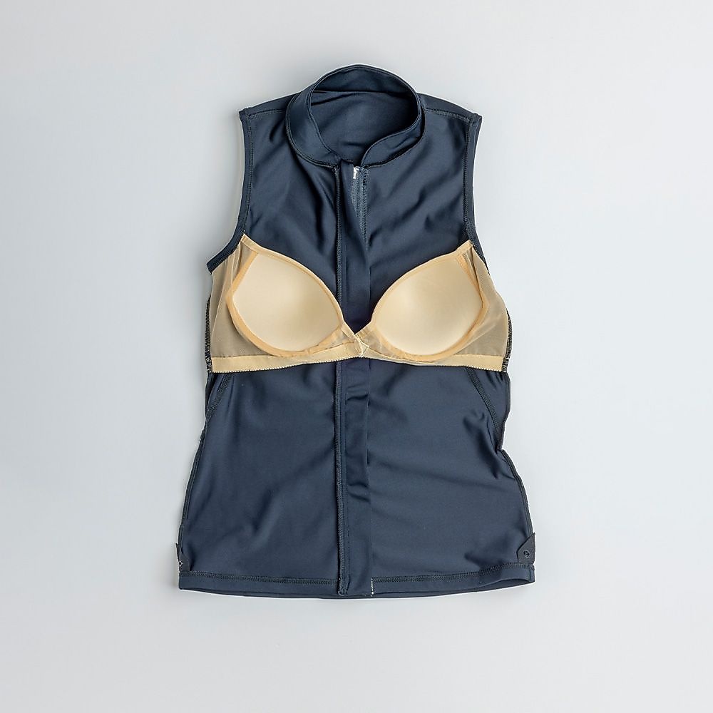 ナイキ SP25 ジップ付き袖なしゆったりシルエット総柄2in1パンツセパレーツ