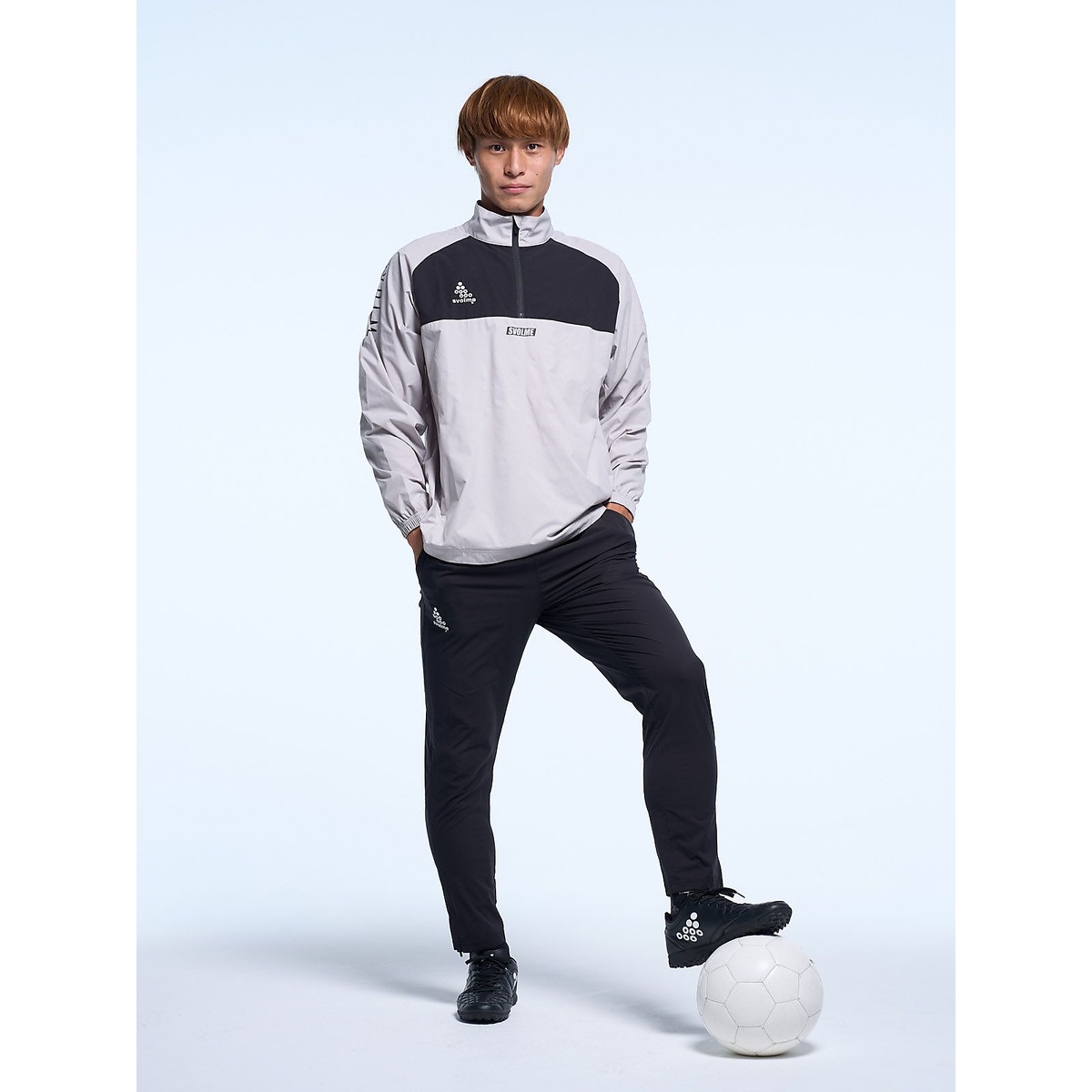 ハーフジップピステトップ