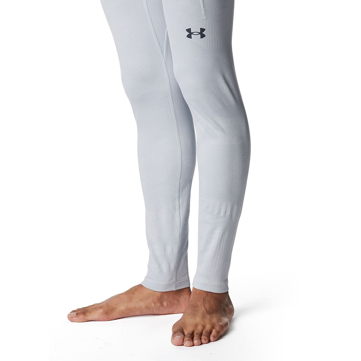 UA MOTIVATE JACQUARD LEG