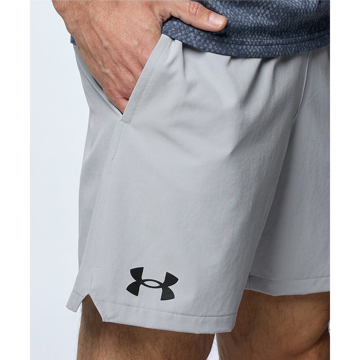 UA WOVEN 7 INCH SHORTS