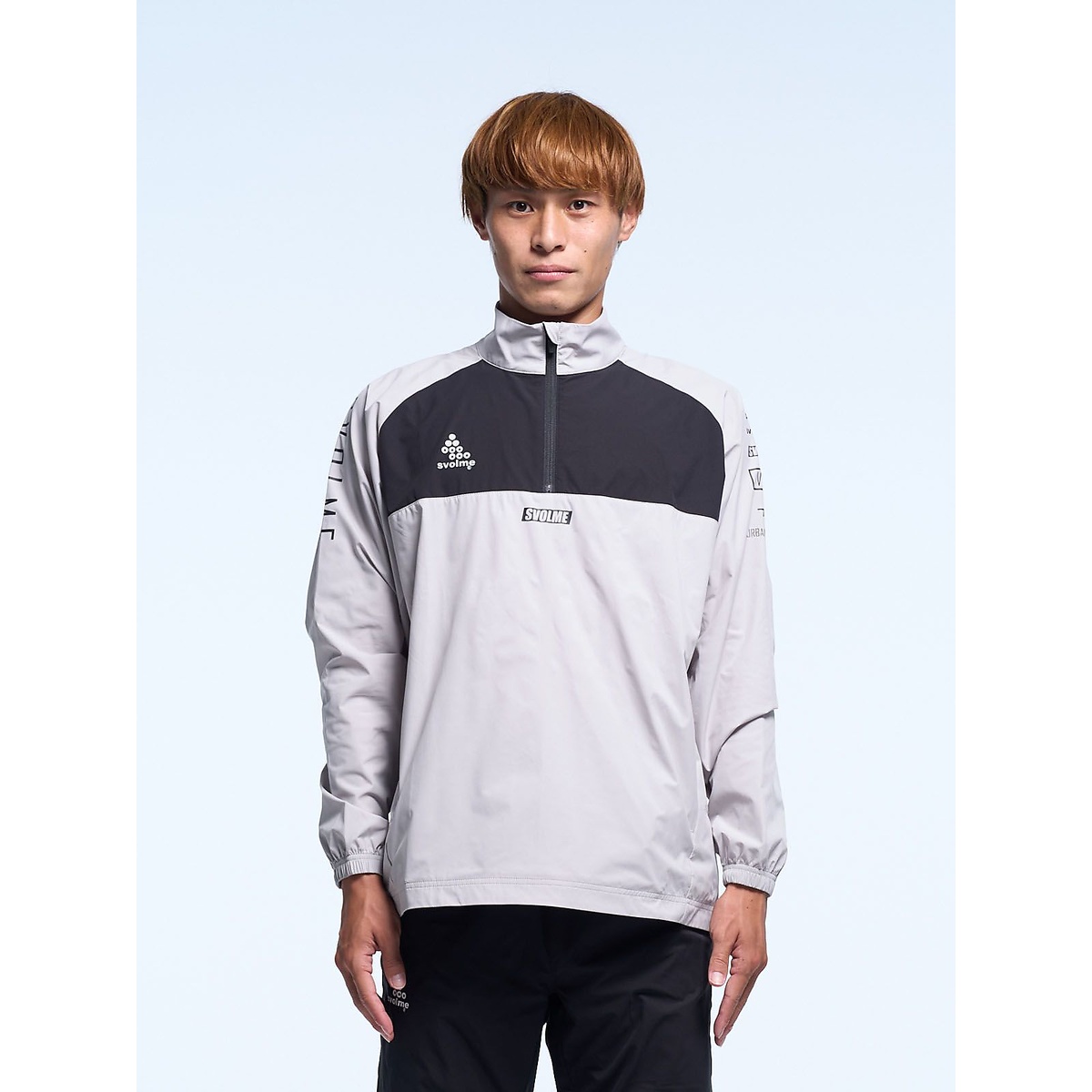 ハーフジップピステトップ