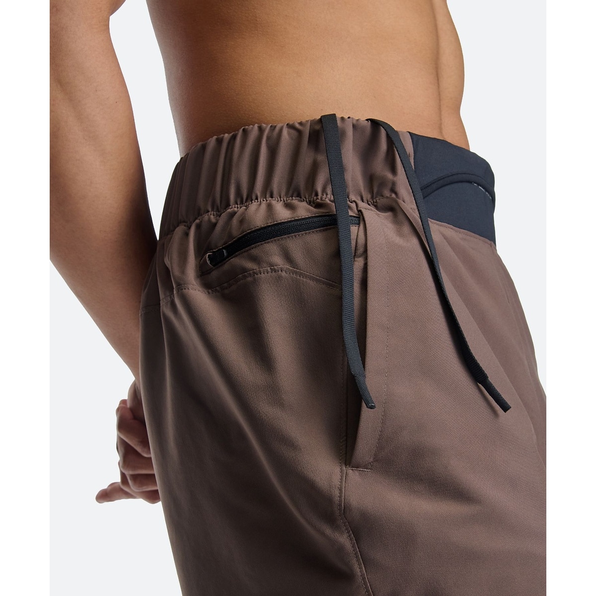 UA MOTIVATE WOVEN SHORTS