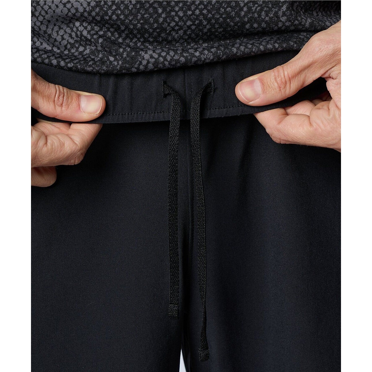 UA WOVEN 7 INCH SHORTS