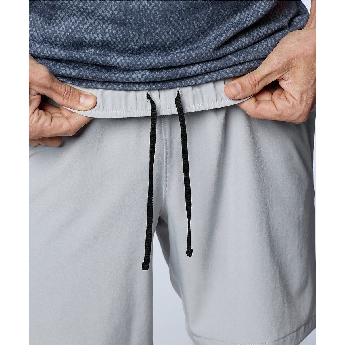 UA WOVEN 7 INCH SHORTS