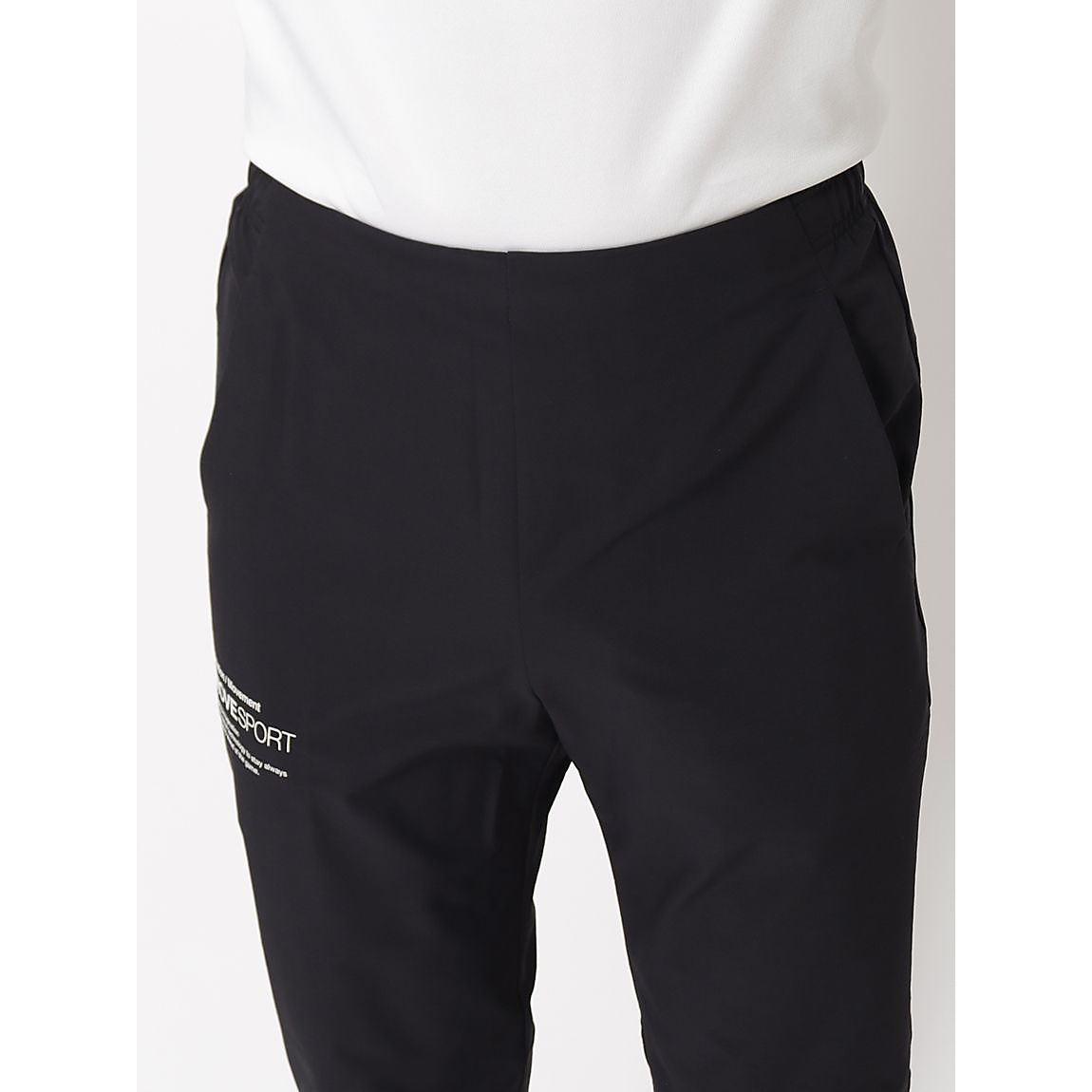 AIRY TRANSFER スパンライク オーセンティックロゴ テーパードパンツ