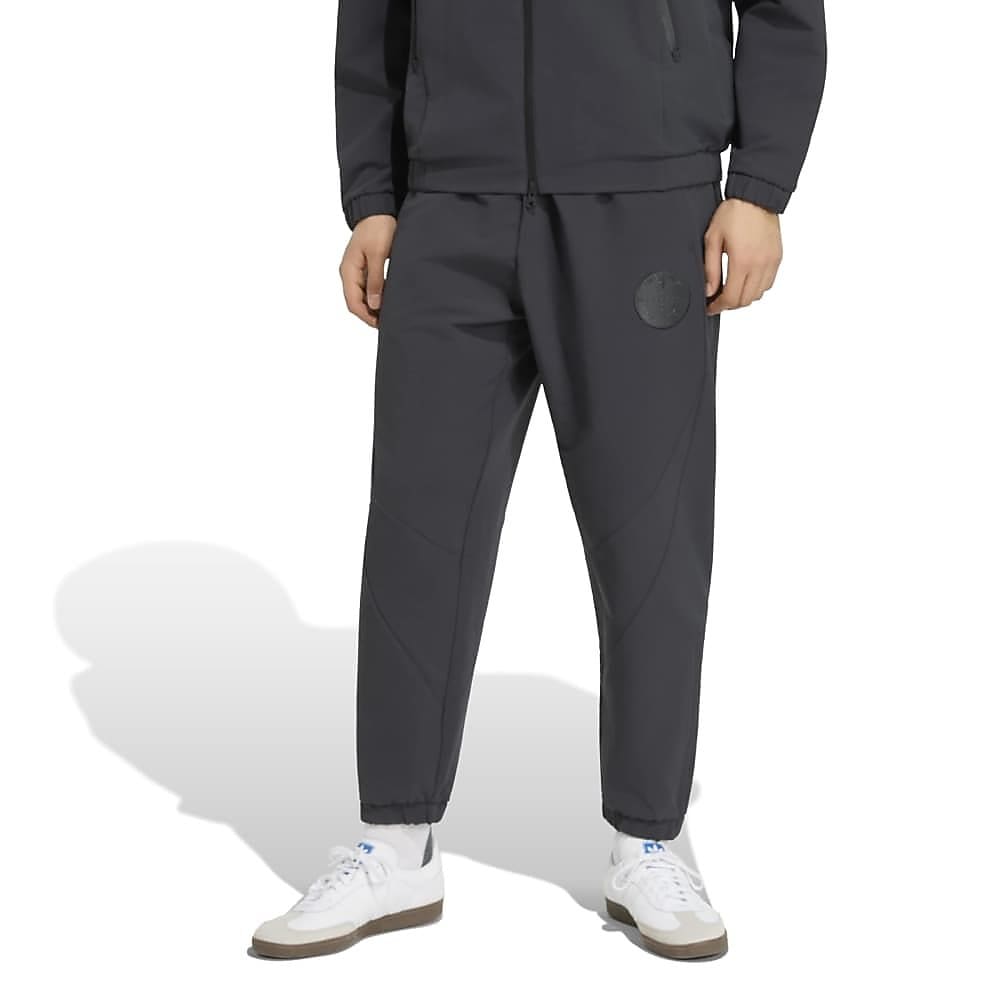T.S.U ELASTIC ZIPPER HEM PANTS