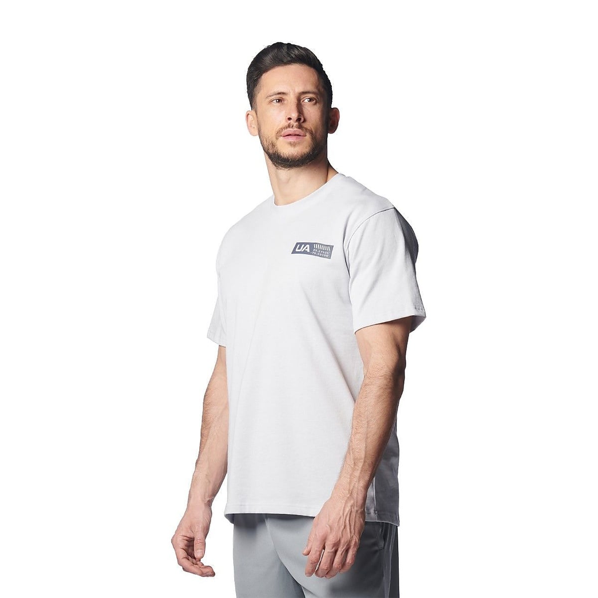 UA HEAVY WEIGHT COTTON SHORT SLEEVE BACK GRAPHIC