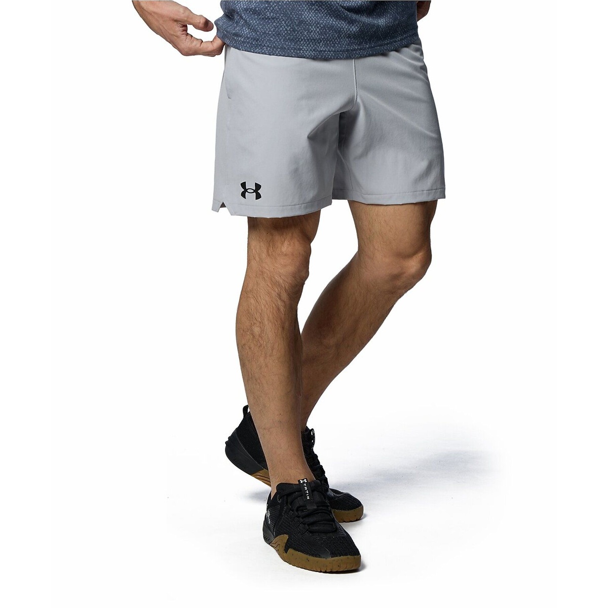 UA WOVEN 7 INCH SHORTS