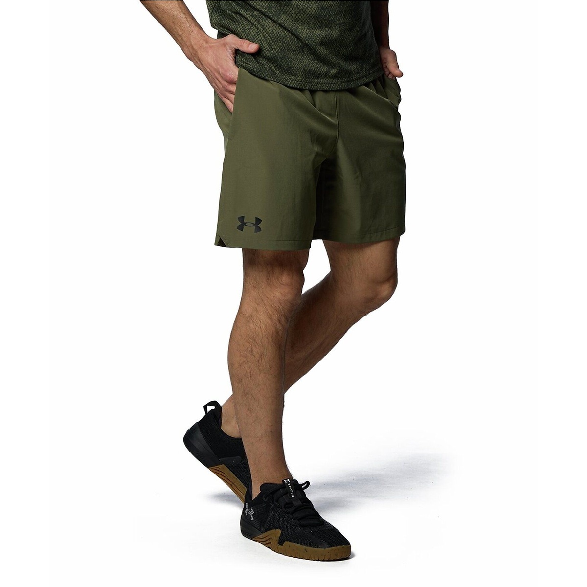 UA WOVEN 7 INCH SHORTS